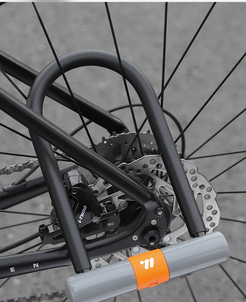 WEST BIKING Anti-Theft U-Lock locked through a bike wheel and disc rotor — Zeus eBikes Canada