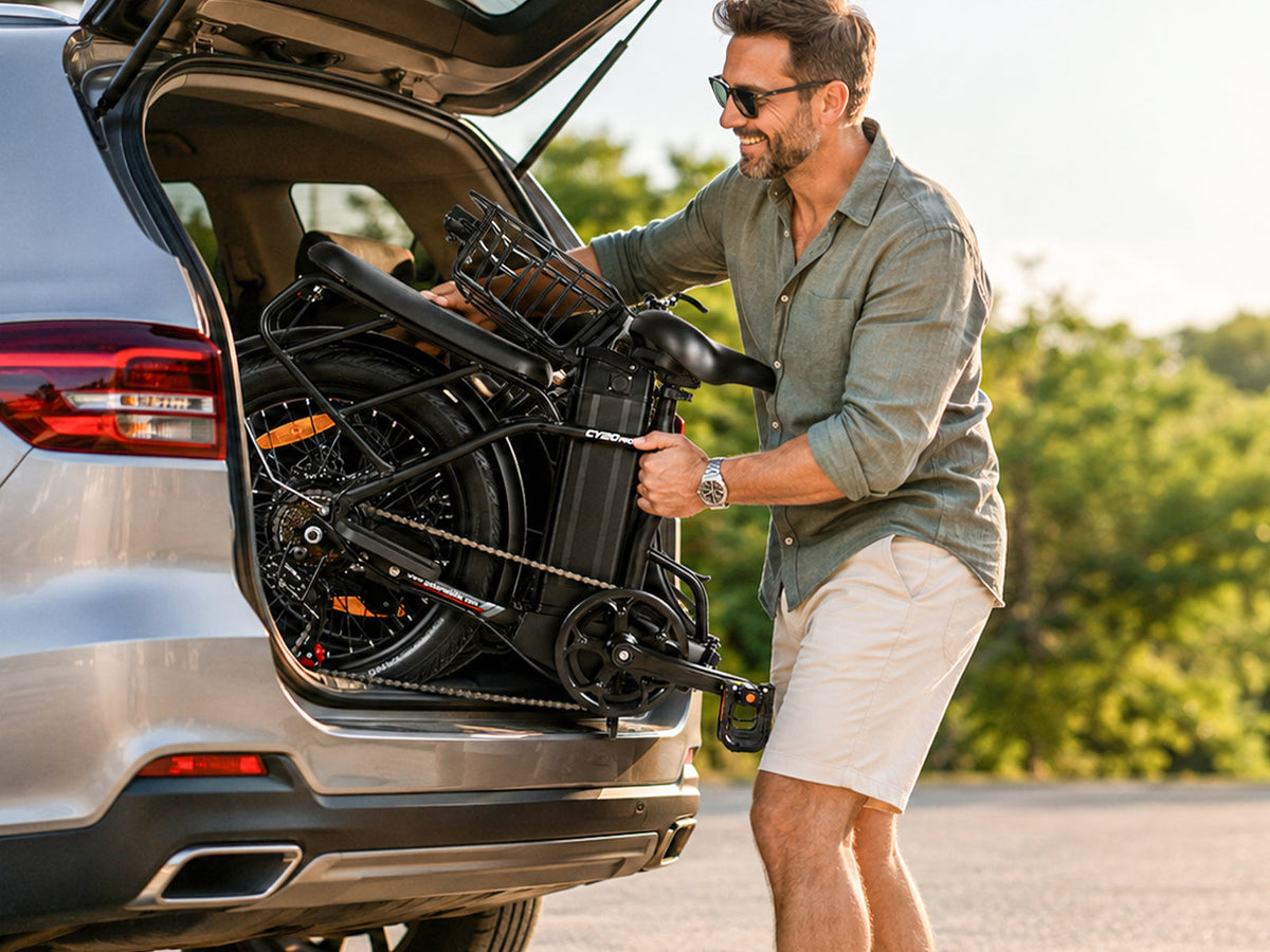 Rider lifting a folded Samebike CY20 Pro into an SUV trunk (Samebike's photo) — Zeus eBikes Canada