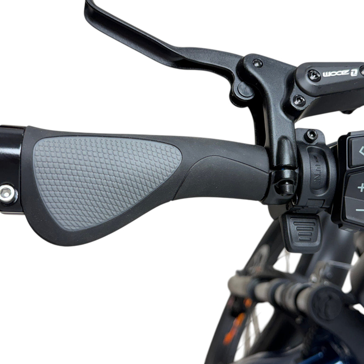 Taubik Axis handlebar grip, brake lever and control pad (Taubik photo) — Zeus eBikes Canada