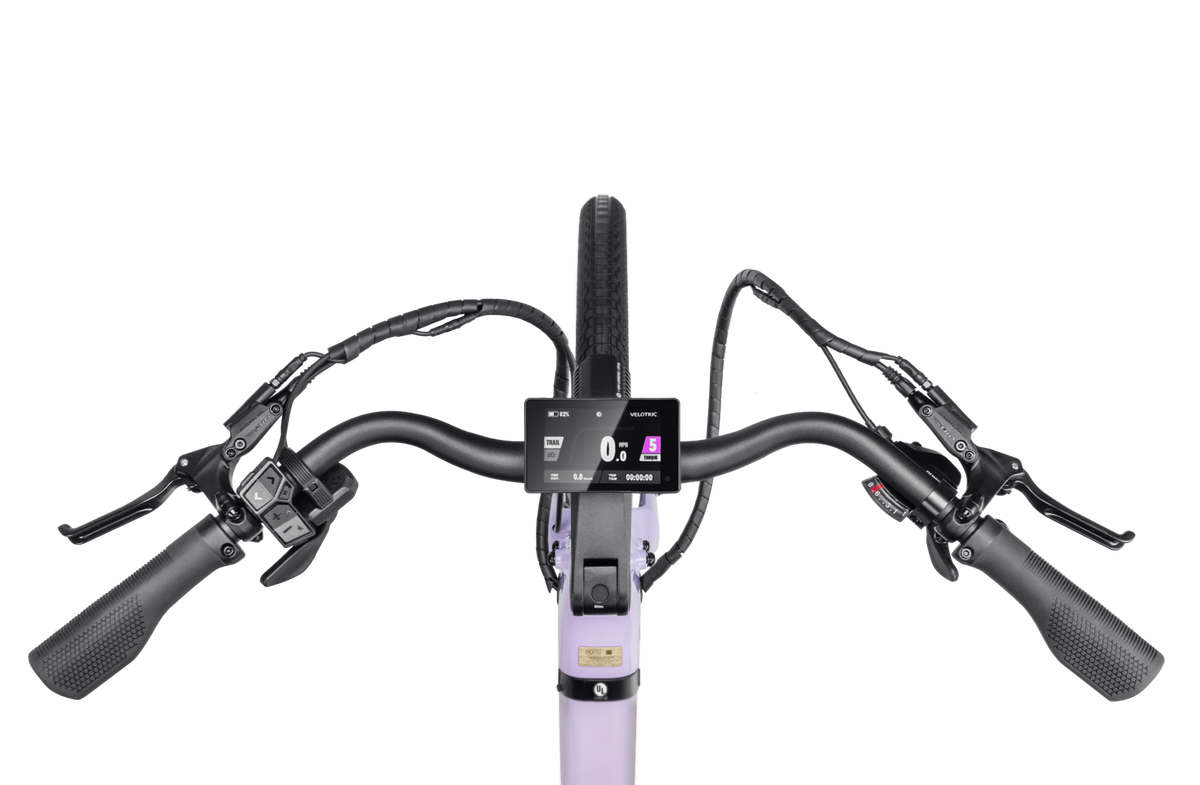 Velotric Breeze 1 cockpit from above: swept-back handlebar, 3.5-inch colour display and controls — Zeus eBikes Canada