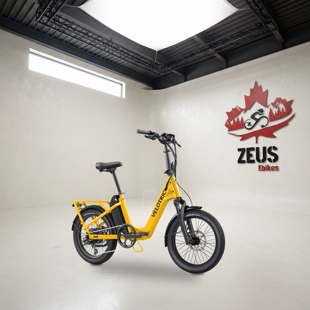 Velotric Fold 1 Plus folding e-bike in Mango: Velotric's own photo set in the Zeus eBikes studio — Zeus eBikes Canada