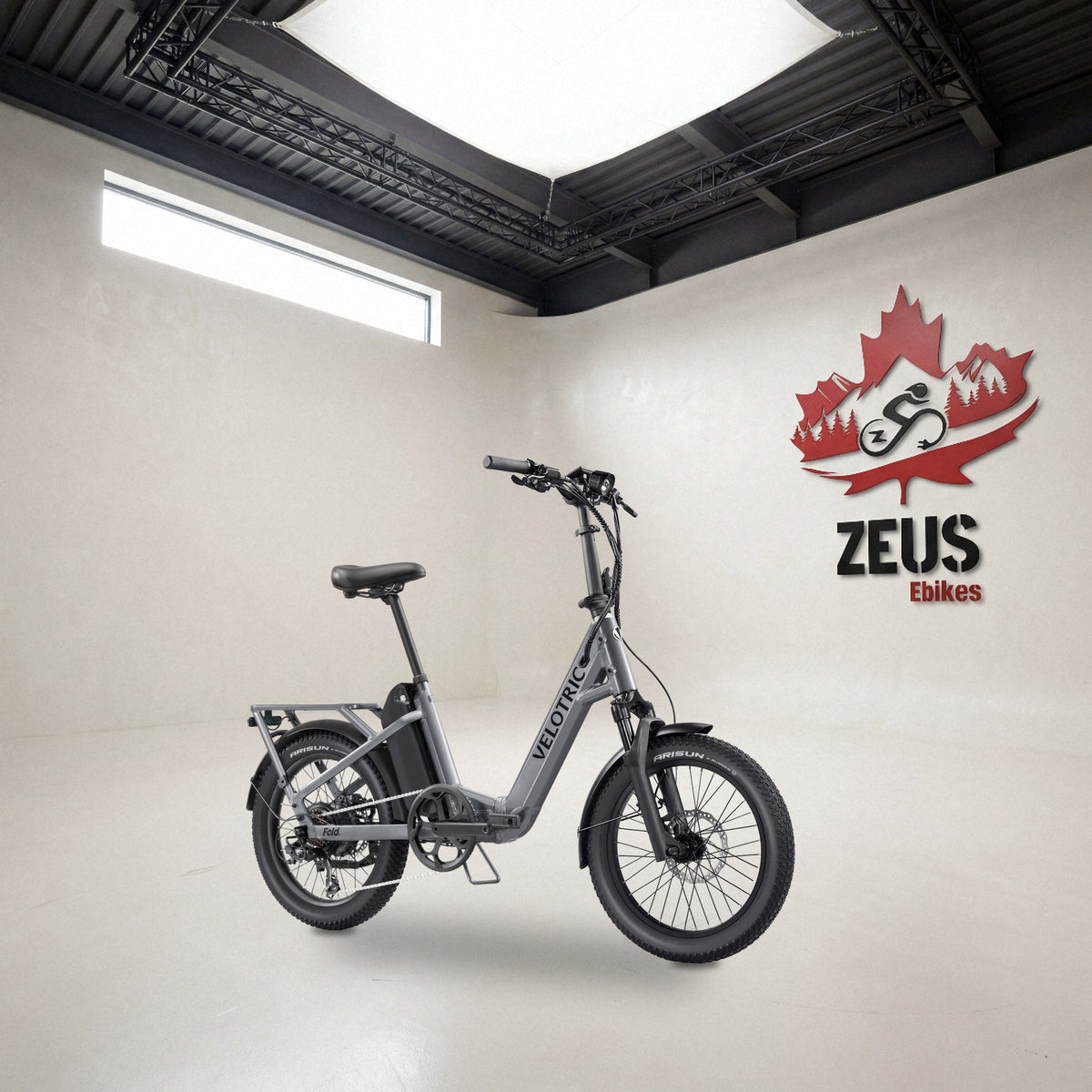 Velotric Fold 1 Plus folding e-bike in Stone Gray: Velotric's own photo set in the Zeus eBikes studio — Zeus eBikes Canada