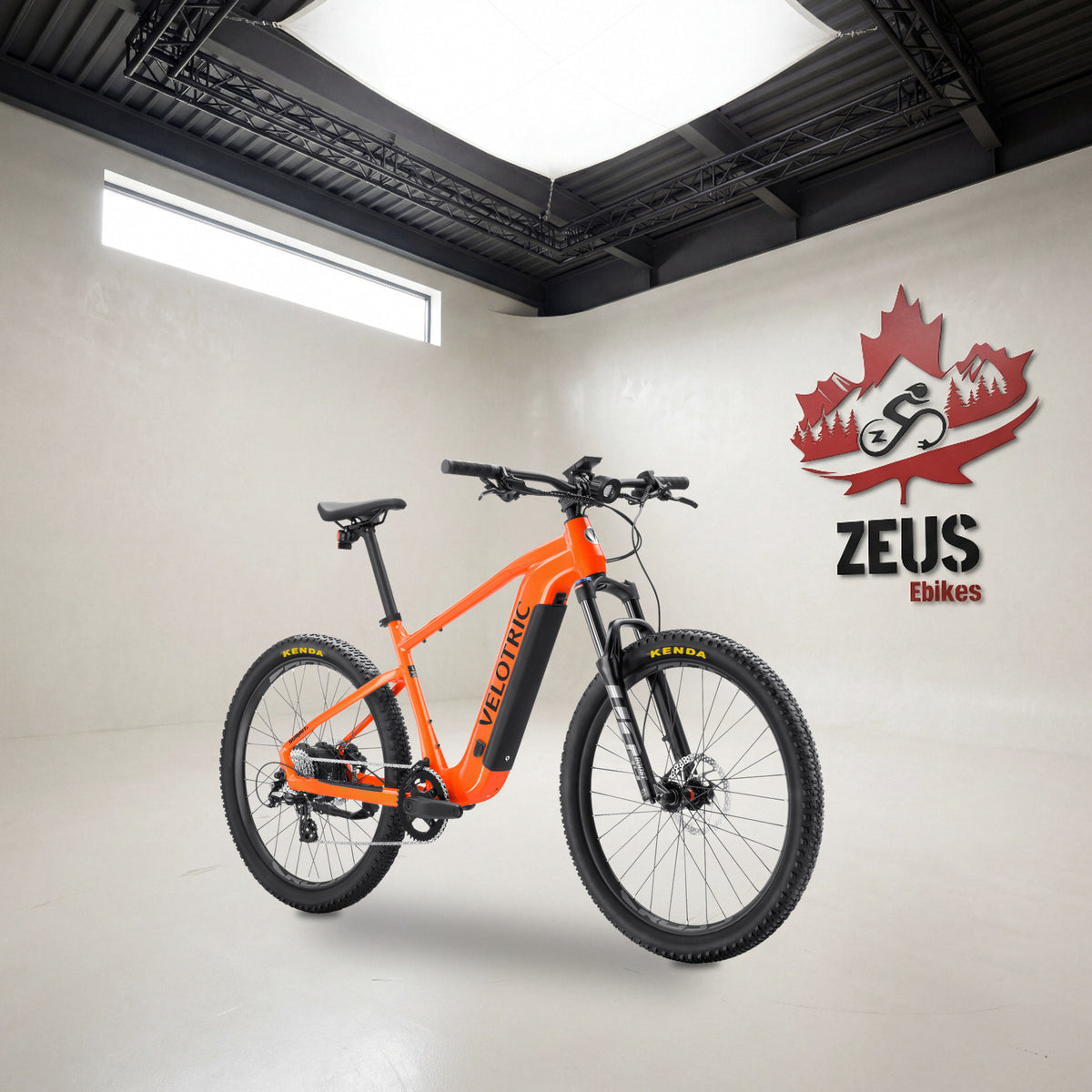Velotric Summit 1 hardtail e-bike in Sunrise Orange: Velotric's own photo set in the Zeus eBikes studio — Zeus eBikes Canada