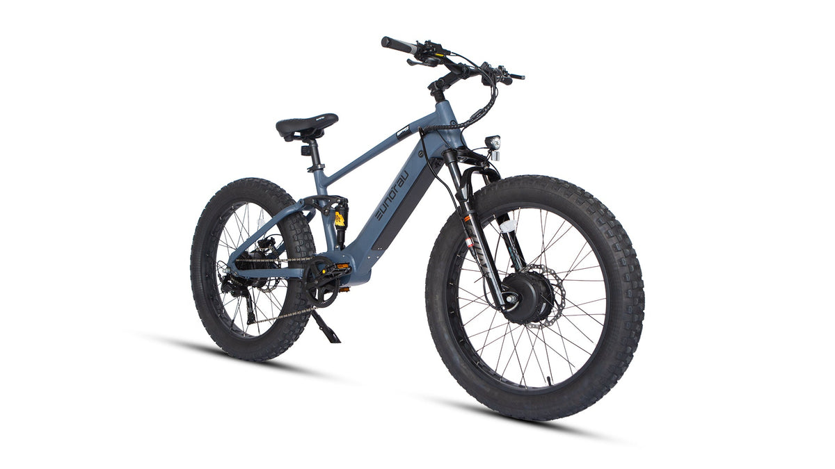 Eunorau Defender-S 2.0 in Moon Black, front three-quarter view: suspension fork, front hub motor and headlight — Zeus eBikes Canada