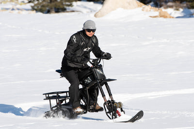 Riding Times GT73 Pro snow track conversion riding through fresh powder — Zeus eBikes Canada