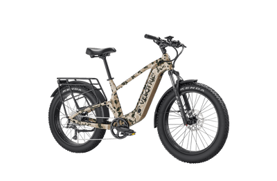 Velotric Nomad 2X High-Step in Multi-Terrain Camo, front three-quarter view — Zeus eBikes Canada