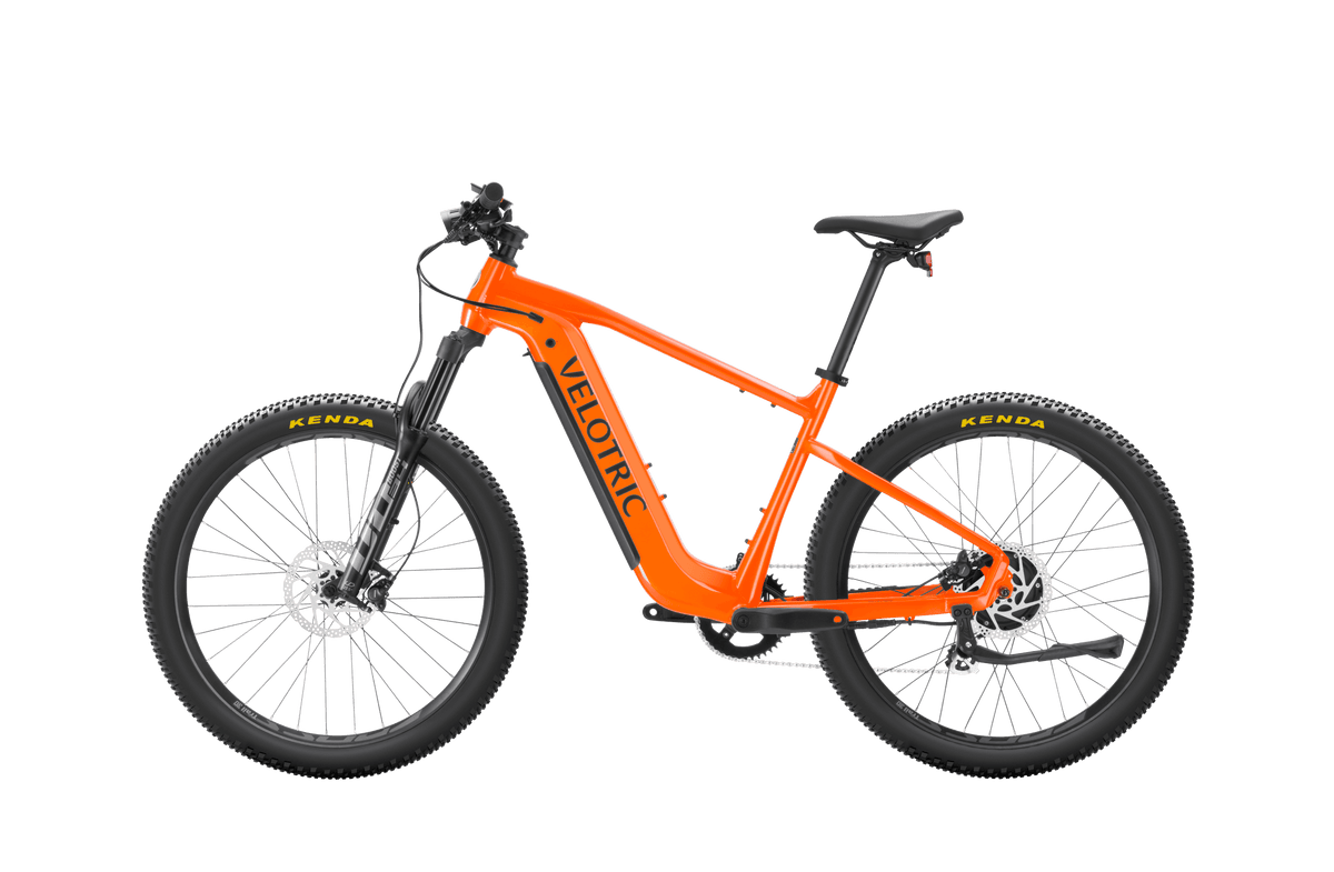 Velotric Summit 1 in Sunrise Orange, left side view — Zeus eBikes Canada