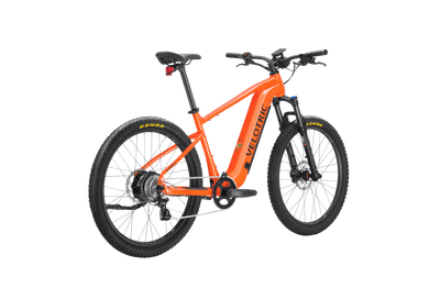 Velotric Summit 1 in Sunrise Orange, rear three-quarter view — Zeus eBikes Canada