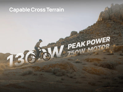 Velotric graphic of a rider on a Velotric Summit 2 on rocky terrain, captioned 1300W peak power, 750W motor — Zeus eBikes Canada