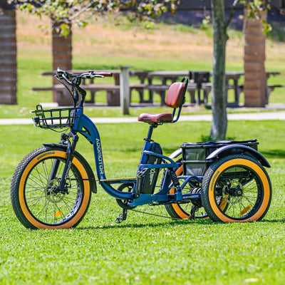 Addmotor Grandtan X in Neptune Blue parked on a park lawn, with a front basket and a rear basket and bag (Addmotor photo) — Zeus eBikes Canada