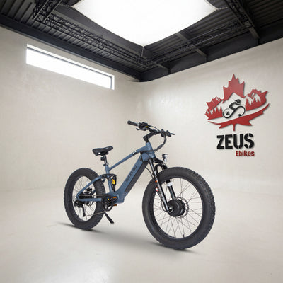Eunorau Defender-S 2.0 / Hunter X6 in Moon Black (slate blue-grey), front three-quarter view: Eunorau's own photo of the bike, set in the Zeus eBikes studio