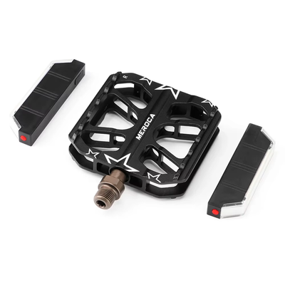 MEROCA pedal body with its light pods lifted out and lying beside it — Zeus eBikes Canada