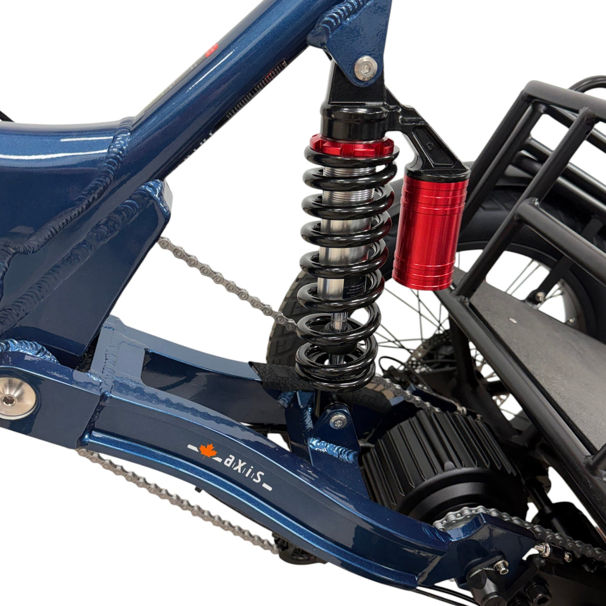 Taubik Axis rear coil shock with red reservoir and the Axis frame decal, Gentian Blue (Taubik photo) — Zeus eBikes Canada