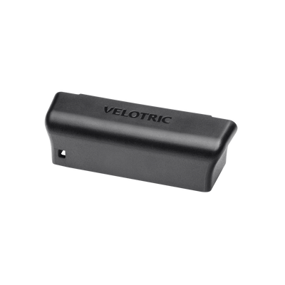 Velotric battery connector cover in black TPU, moulded with the Velotric logo