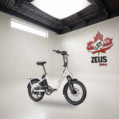 Velotric Fold 1 Plus folding e-bike in Pearl White: Velotric's own photo set in the Zeus eBikes studio — Zeus eBikes Canada