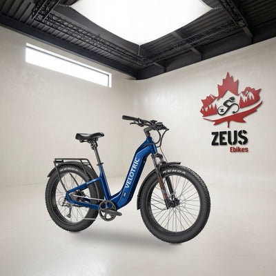 Velotric Nomad 2 fat-tire e-bike, Step-Thru frame in Midnight Blue: Velotric's own photo set in the Zeus eBikes studio — Zeus eBikes Canada