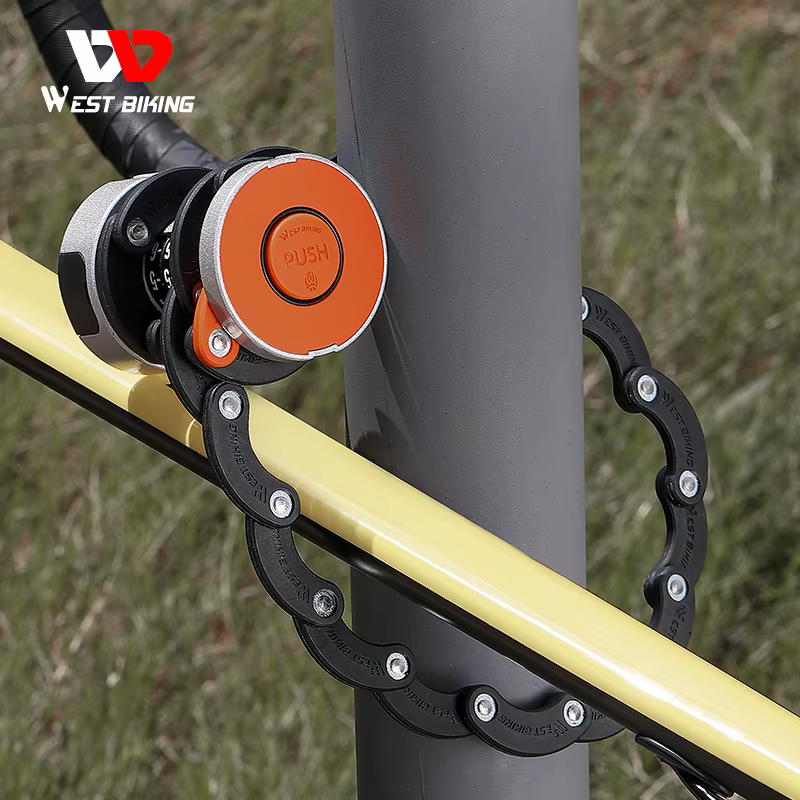 West Biking folding lock in orange, closed around a grey post and the yellow top tube of a road bike — Zeus eBikes Canada