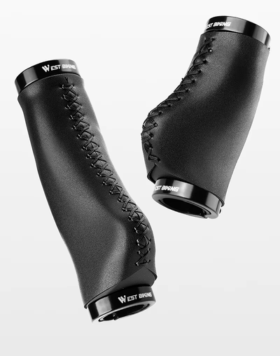 West Biking long and short grips in black microfiber, one long and one short, with stitched covers and black lock rings — Zeus eBikes Canada