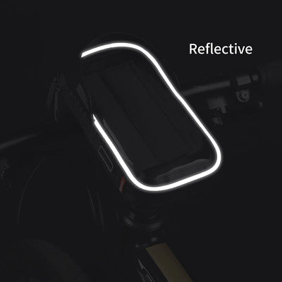 Reflective trim on the WEST BIKING waterproof bike phone bag glowing at night — Zeus eBikes Canada
