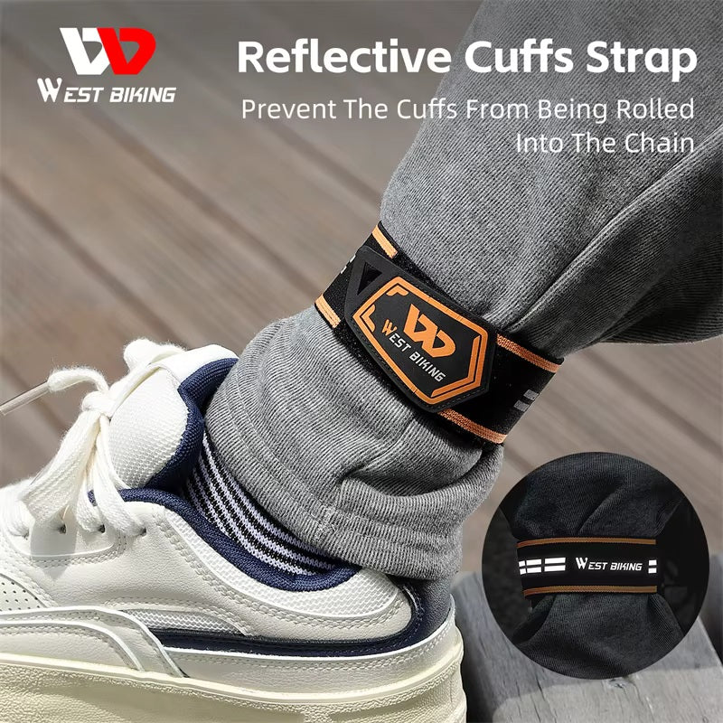 Reflective cycling ankle strap fastened over a grey trouser cuff above a white trainer